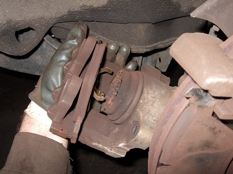 Remove the inner brake pad from the brake caliper.